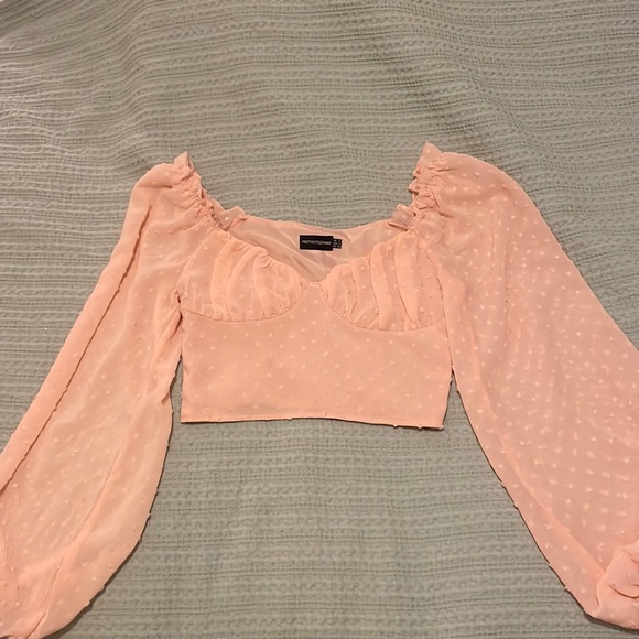 PrettyLittleThing Tops - Cropped long sleeve light pink polka dot top